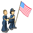 Service persons with waving American Flag