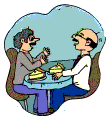 Two men at table talking
